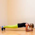 woman performing plank exercise
